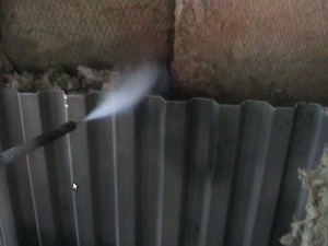 Smoke Wand Being Used for Boiler Air Inleakage Identification